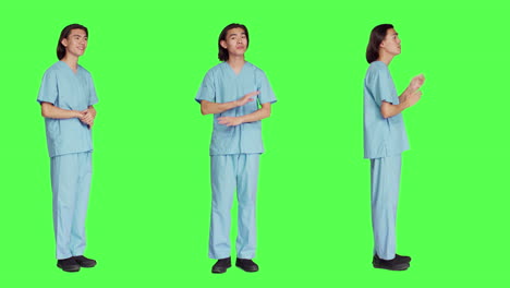 Asiatische-Krankenschwester-Nickt-Vor-Der-Kamera